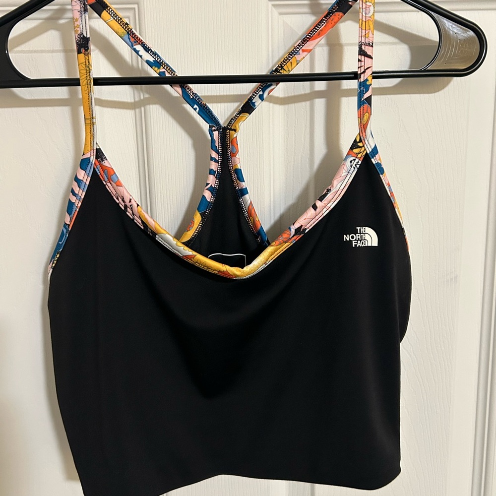 The North Face Halter Tank Top. Black with tropical / floral details. Size M